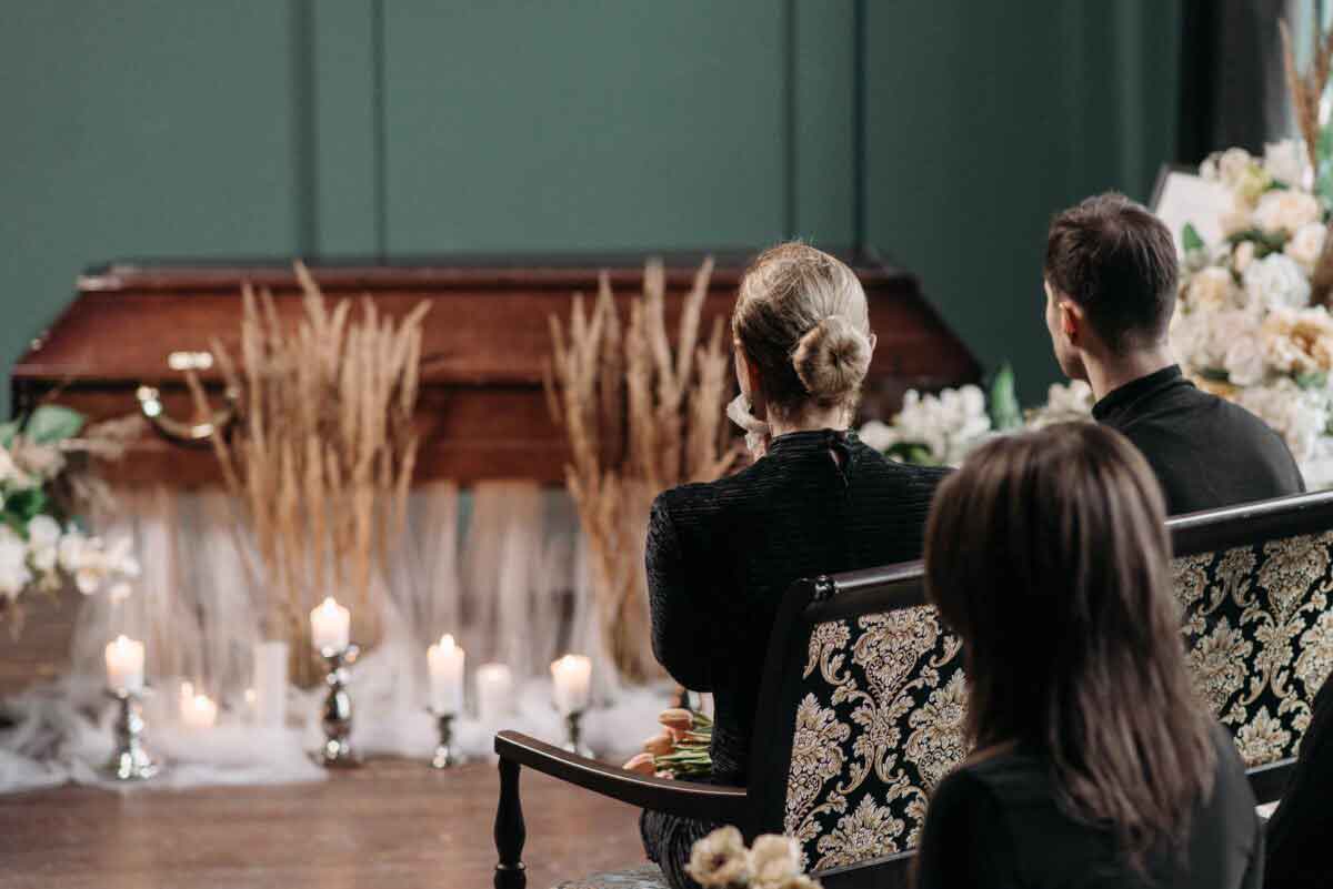 People mourning at funeral